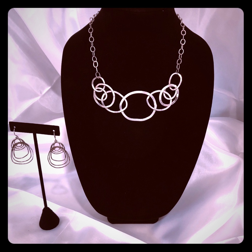 Silver necklace and earring set